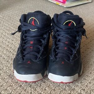 Jordan Kids Black Sneakers with Red and Yellow Accents